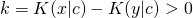k = K(x|c) - K(y|c) > 0